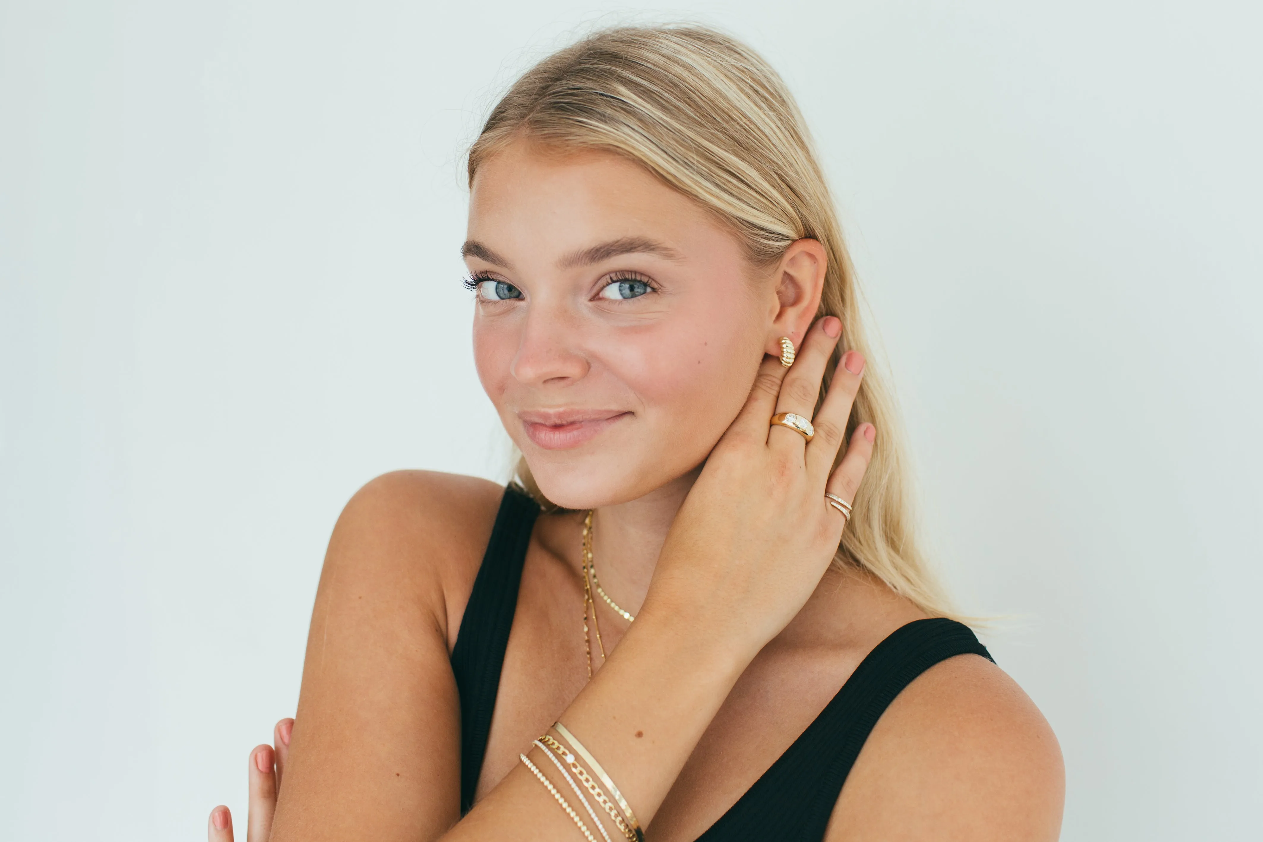 10 Karat Gold Croissant Huggie Earrings