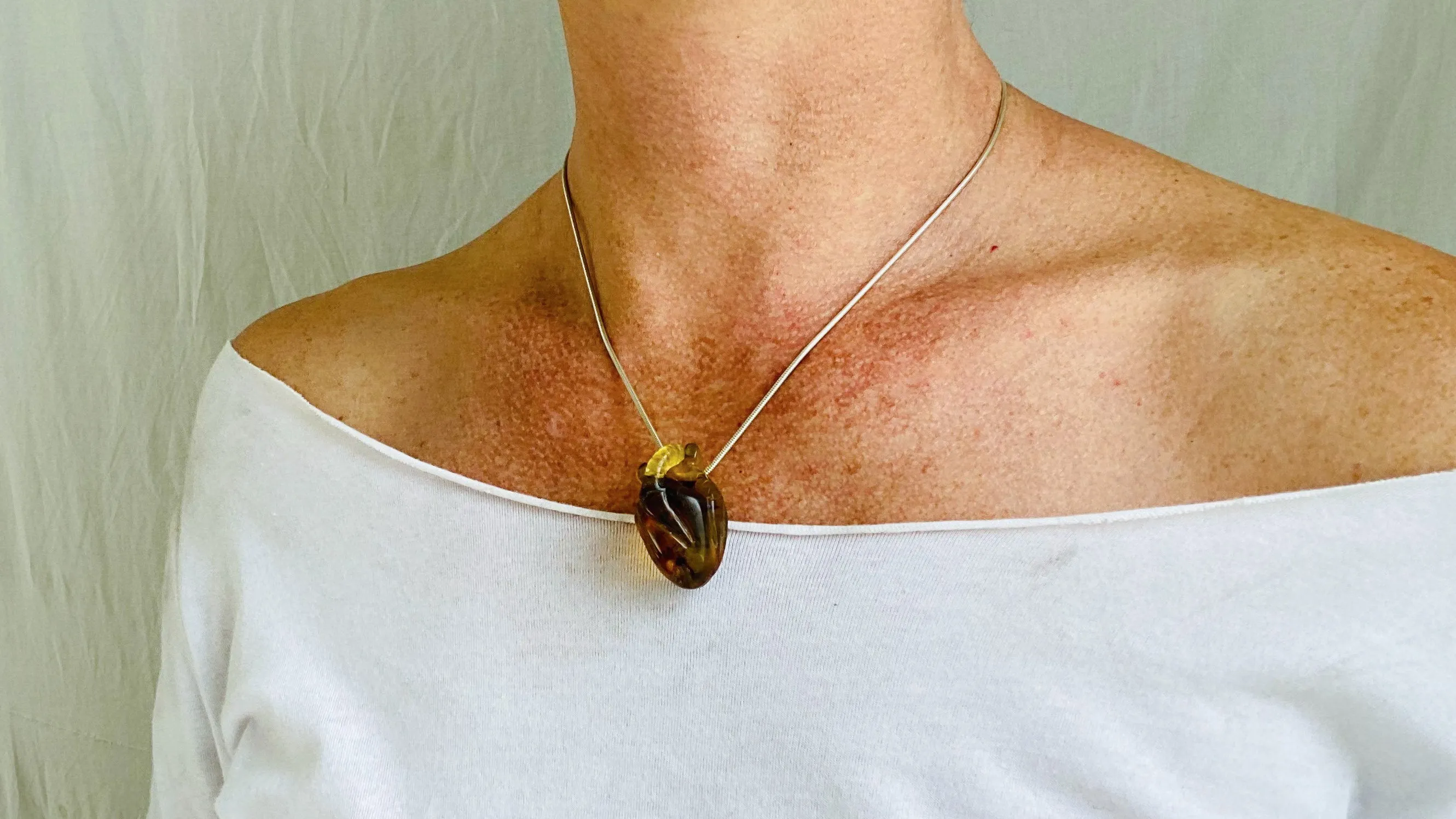 Amber Anatomic Heart Pendant on Sterling Silver Snake Chain. Atelier Aadya