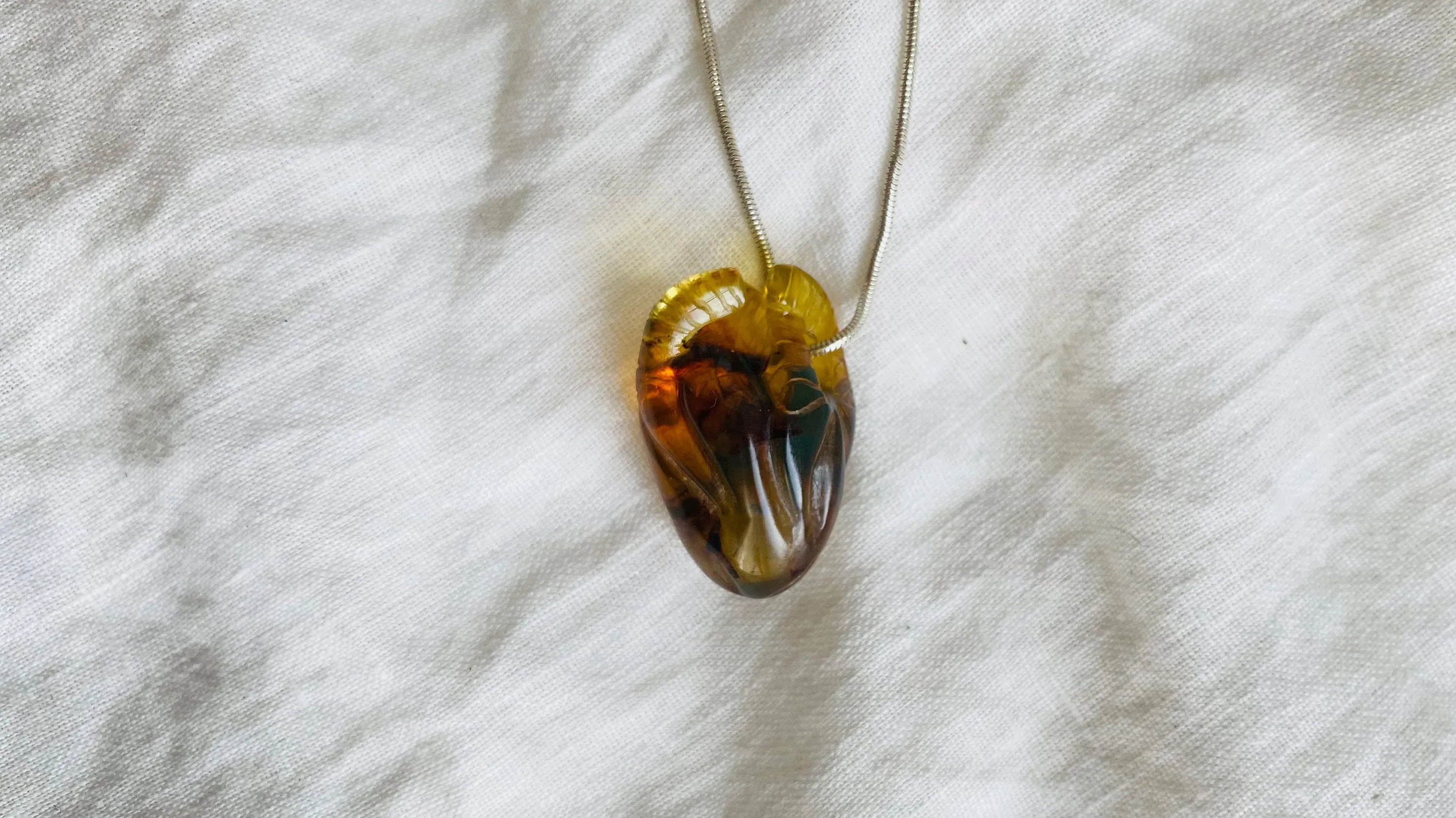 Amber Anatomic Heart Pendant on Sterling Silver Snake Chain. Atelier Aadya