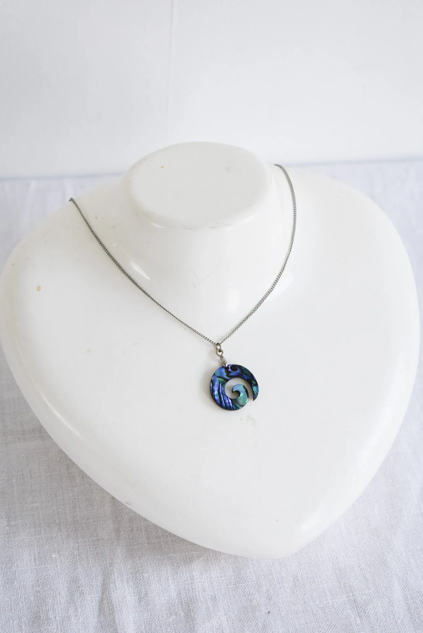 Wood   Paua Koru necklace