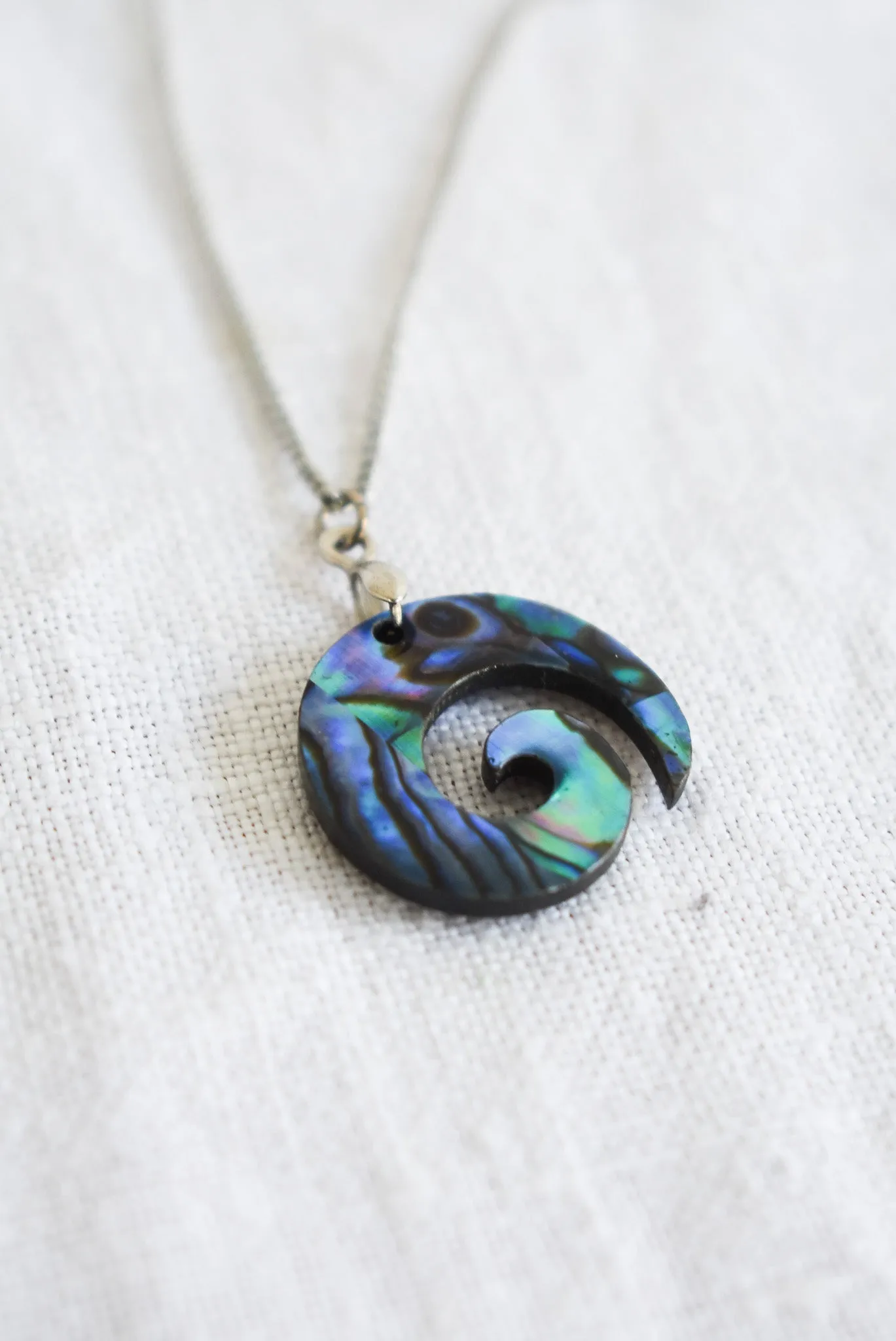 Wood   Paua Koru necklace