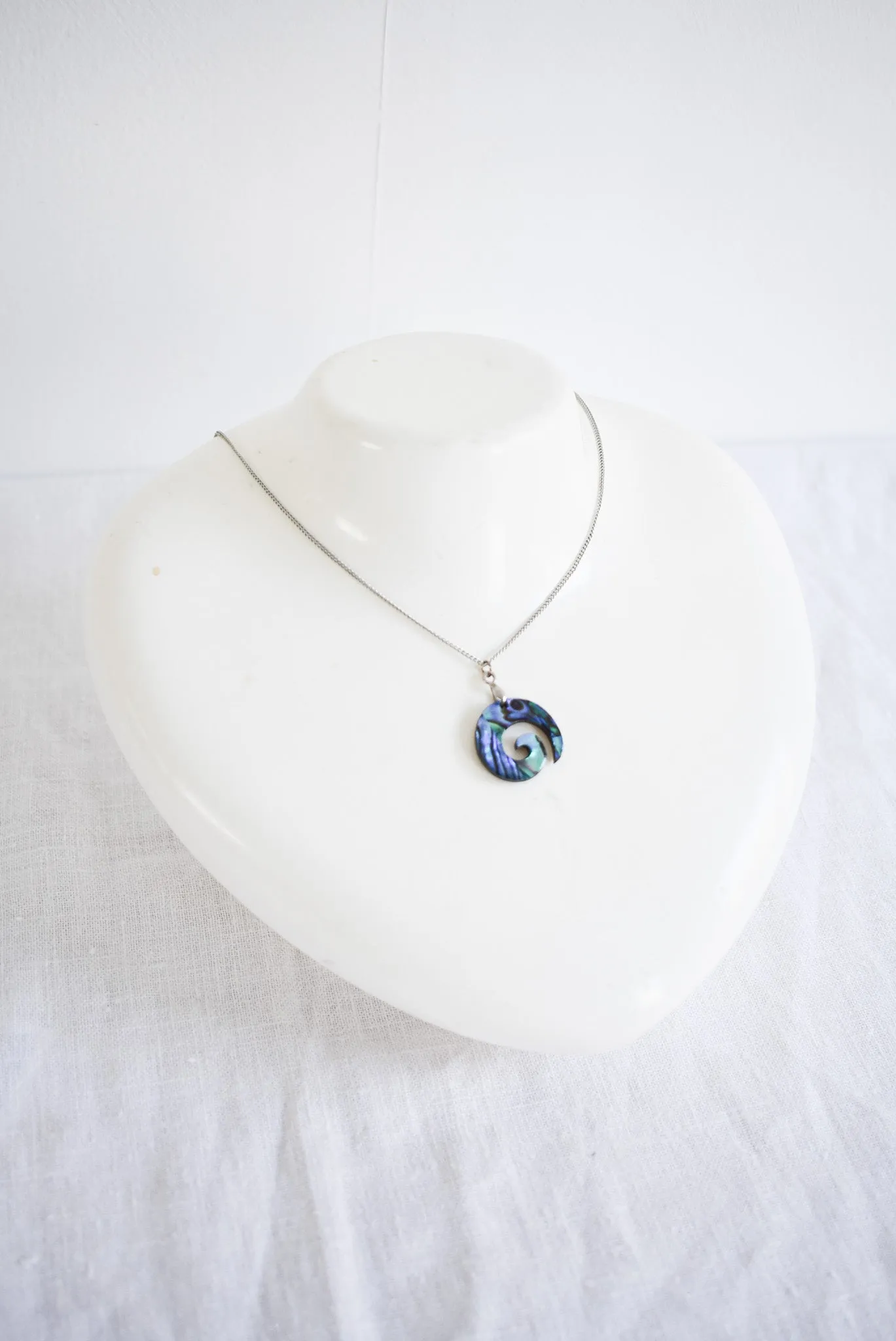 Wood   Paua Koru necklace