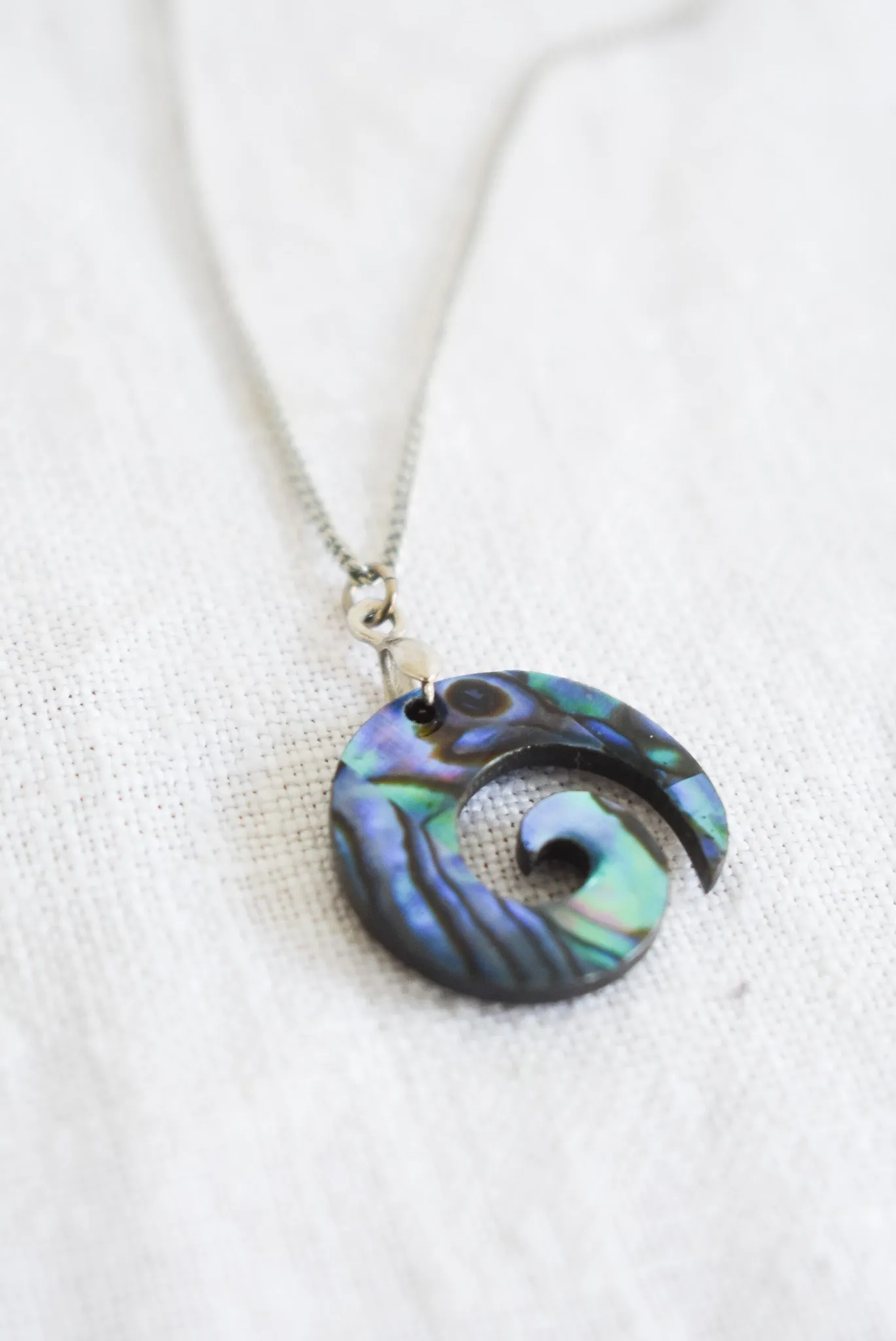 Wood   Paua Koru necklace